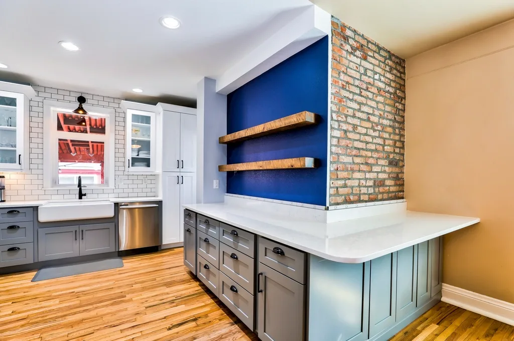 Subway splashback beside a brick feature wall