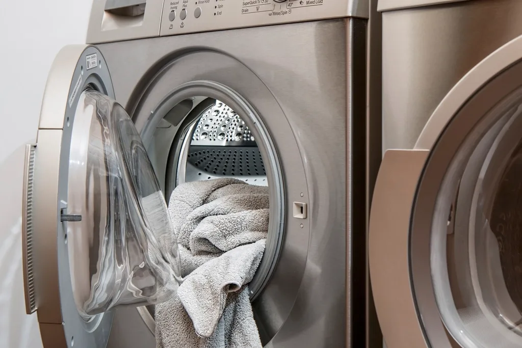 Front-loader set into the tiled laundry
